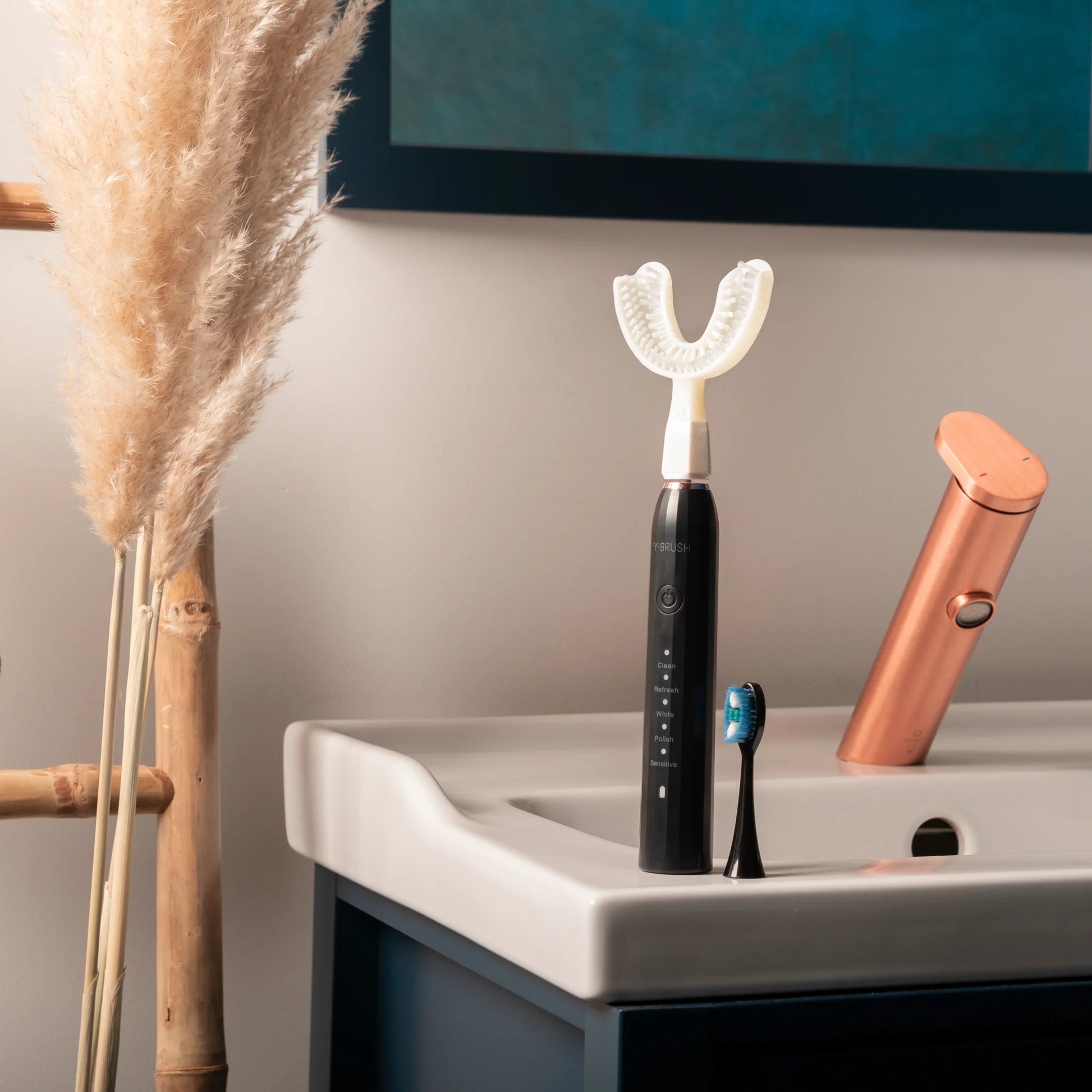 view of Y-Brush DuoBrush electric sonic toothbrush in an bathroom