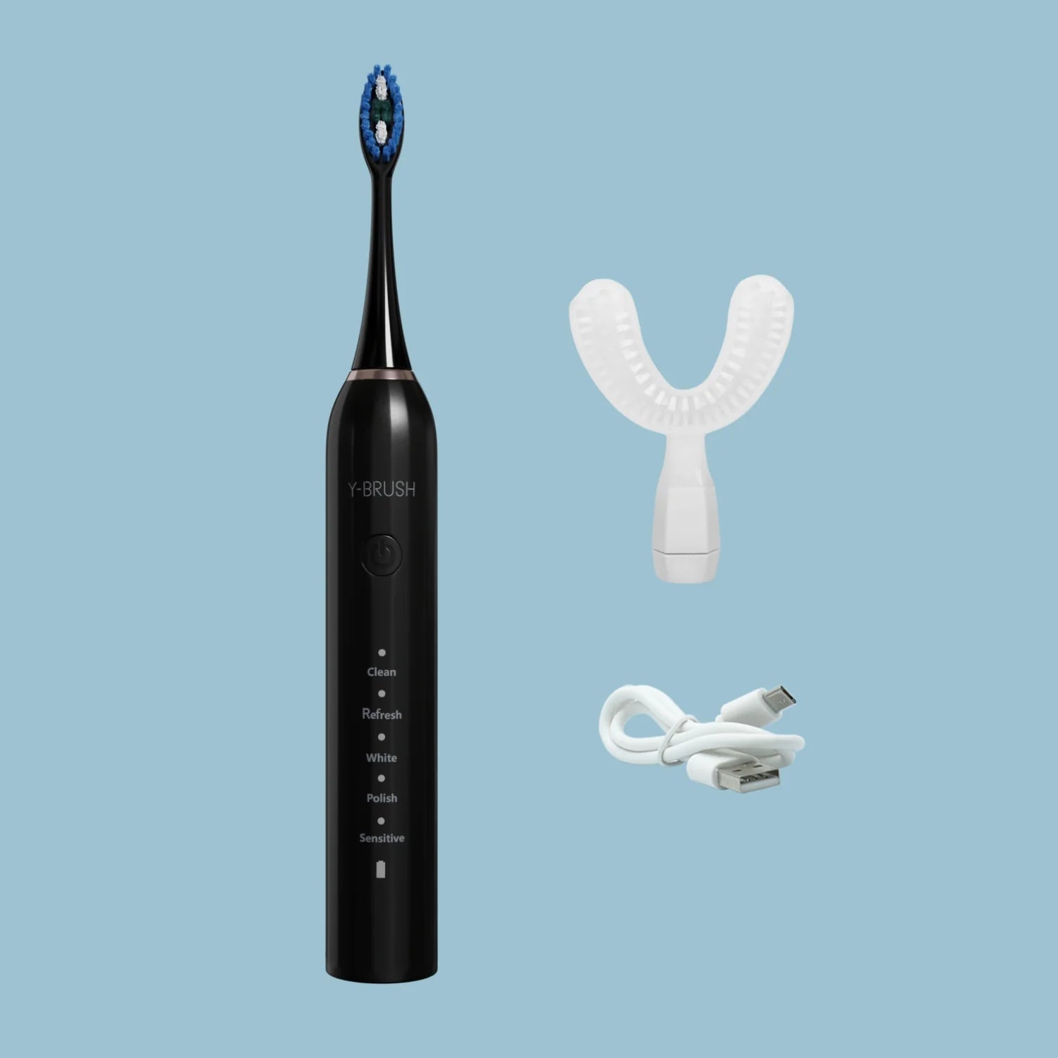 view of a Y-Brush DuoBrush electric sonic toothbrush on a blue background