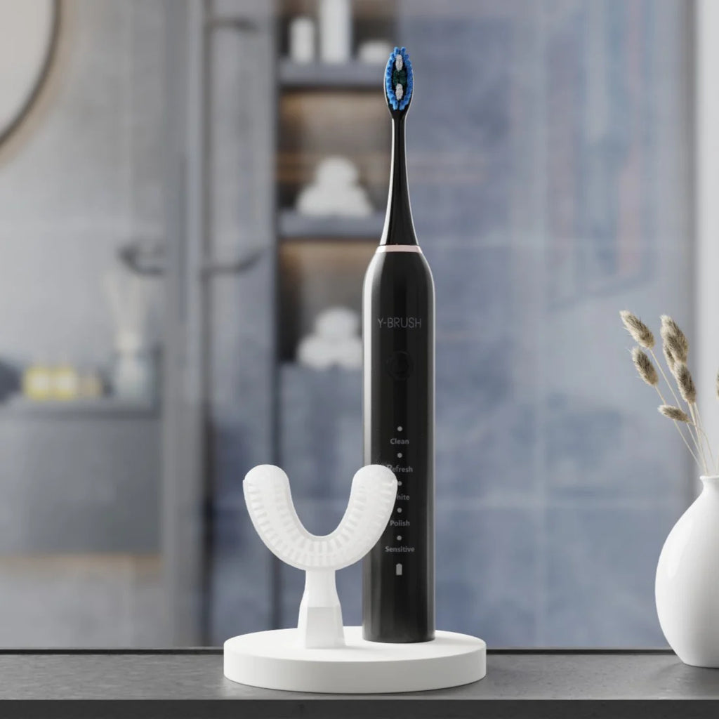 view of Y-Brush DuoBrush electric sonic toothbrush in a bathroom