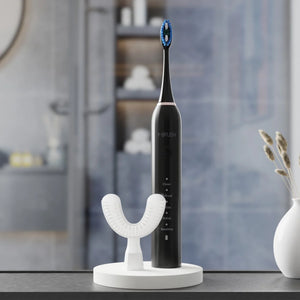 view of Y-Brush DuoBrush electric sonic toothbrush in a bathroom